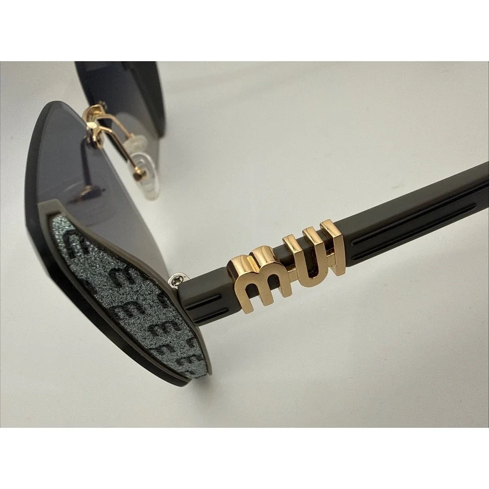 Miu Miu Aube Authentic Womens Sunglasses Black frameless Gold trim Gradient Lens